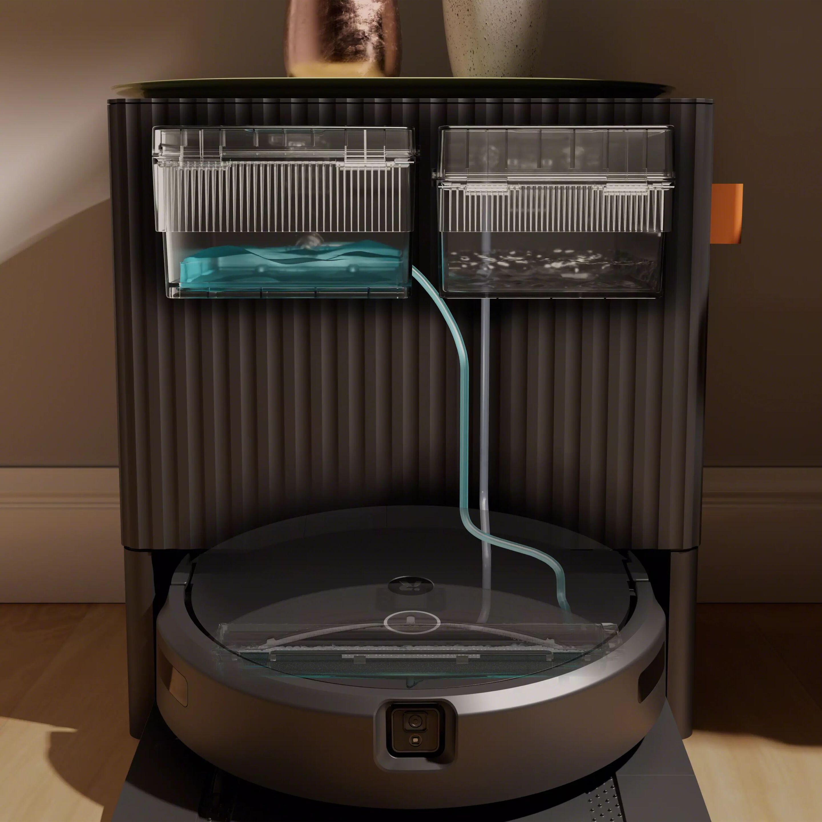 Cleans the mop. And itself.